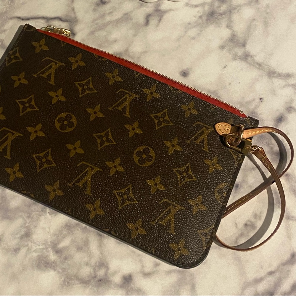Authentic Louis Vuitton Wristlet - Red Interior - Great condition - Code Inside